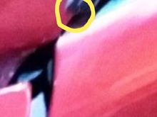 Heres the pic of the "real car" zoomed in. I still see paint on the drip rail. This pic was taken a lot farther back