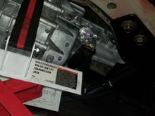 Didn't get a pic of the crossmember installation on the final trans install, so here it is from my test fit, when I marked the shifter location.  MAKE SURE THE TORQUE ARM IS ON THE OUTSIDE OF THE MOUNT, towards the trans tunnel!  