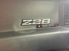 here you can see my attempt at removing it and the white stain it left