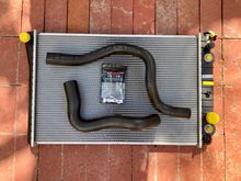 Radiator $0.00 (AutoZone LLW), Upper Radiator Hose $22.09, Lower Radiator Hose $17.67, Hose Clamps $4.41, Concentrate Antifreeze/Coolant $23.75 and 50/50 Antifreeze/Coolant $0.00 (AutoZone Rewards)