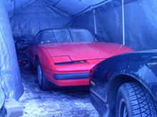 This is my buddy's '85 Firebird. After I got my '86 TA he wanted an F body for himself. He settled on this 1 owner car that is equipped with the 2.8L V6, T5 manual, T roof and not much else... SOLID body and underpinnings, he stole it $500... now we can cruise around this summer with our wives riding "shotgun" while the roof is open and the tunes are cranked.