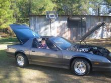 Randi checking out the car.