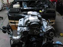 Getting ready to drop in the newly built tpi engine.
