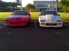 Camaro parking Lot with a 1986 blue Camaro RS that is been rebuilt by a friend at work.