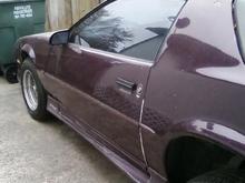 its on jack stands right now that's why there's a big gap in the rear fender well