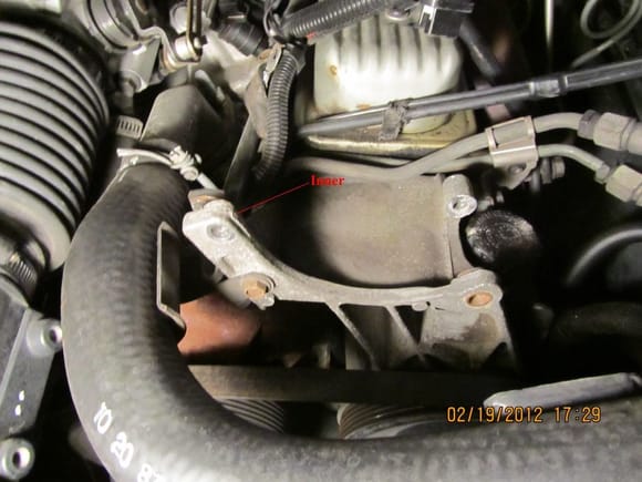 Remove CS-130 alternator (and braces to intake manifold and exhaust manifold.)