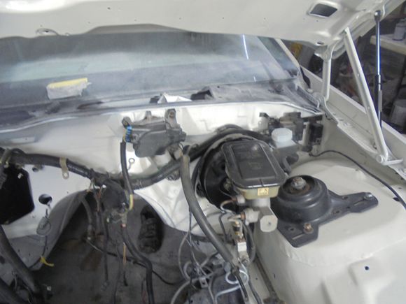 Wiper motor back in place. 