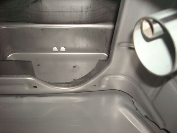 Internal metal walls similar to the factory tank.