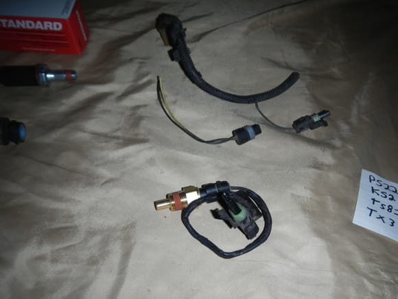 Temp switch for the driver side head and some of the random plug ends I had plus the intermediate harness. I'll have to find a good one or replace the connector on this one.