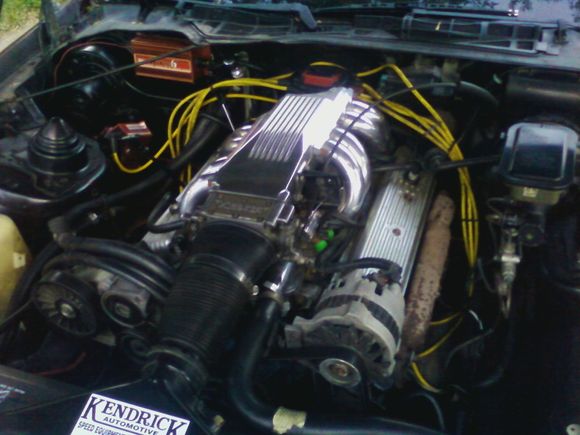 The engine is a .040 over 327 based off a 1991 4-bolt 350 roller block.  The bottom end is balanced, and it has a GMPP LT4 Hot Cam.  The heads are 63cc swirl port heads with LT1 springs, modded and port matched to the TPI, itself off a 1985 Corvette.  The injectors are 28 lb/hr, fed by an MSD 2225 electric pump.  Spark comes from a Mallory Hyfire 6A, and external coil, and a gutted HEI that only has the pick up coil.  It also has full A/C and emissions delete (it's exempt by age).