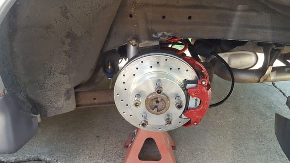 Painted rebuilt calipers on rear and installed 19lb spring in master cylinder. Cross drilled rotors from BRAKEPERFORMANCE.COM