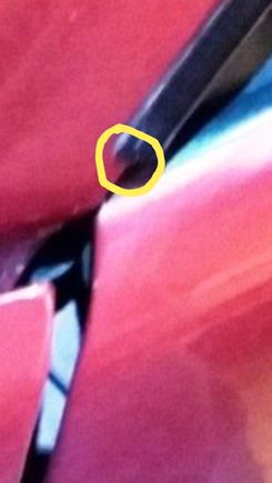 Heres the pic of the "real car" zoomed in. I still see paint on the drip rail. This pic was taken a lot farther back