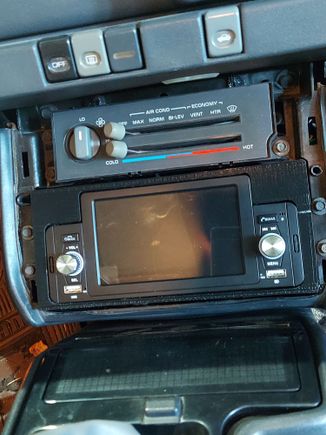 Used brackets from a regular single DIN adapter kit that I had in the attic.