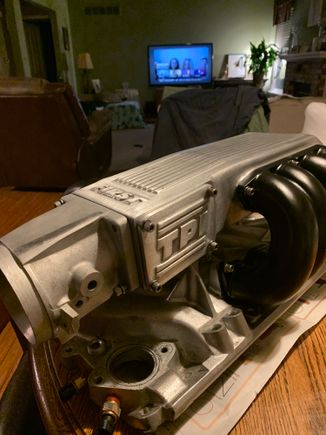 Satin finish on plenum. Runners powder coated in Matte River Black. Manifold natural glass beaded aluminum. Rails and injectors not shown