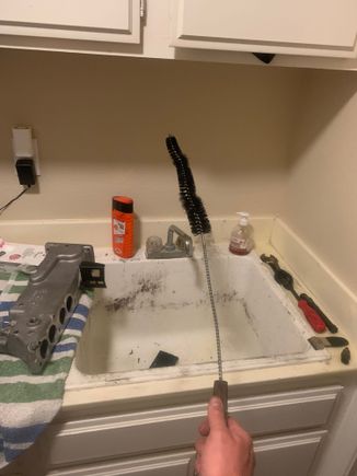 Dryer duct cleaner brush from Home Depot, easy to manipulate to clean runners and plenum