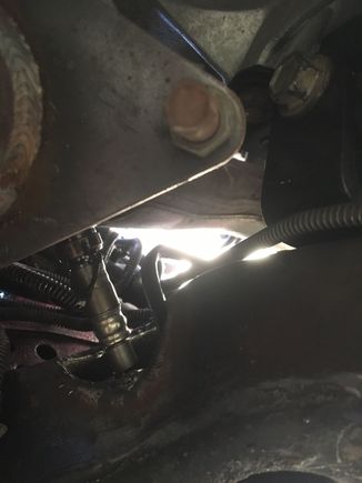 You can see a brake line in this photo on right