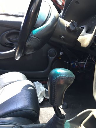 A close up of the trans am speakers. notice six speed shifter in foreground.