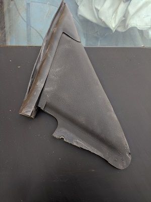 Drivers side. This broke off the metal bracket today. Would like the metal bracket and this piece attached. I dont need the small rubber seal on teh left side. 