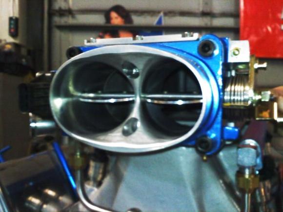 professional products 58mm throttle body. i had to sand and polish the throttle body to make it a built in air foil. they are horrible and rough from the factory