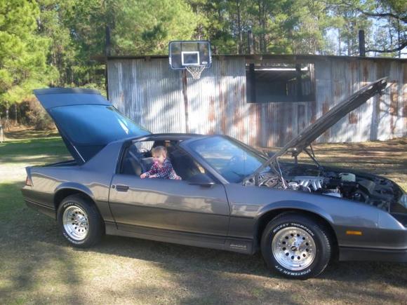 Randi checking out the car.