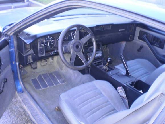 Interior is in pretty good shape, (smelly smoker car) everything works as it should, someone stole the stereo which I could care less about the cd player but why do they have to break the damn dash!!! :(