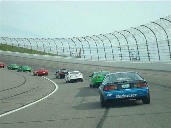 Driving around Kansas Speedway with 50 2010 Camaros