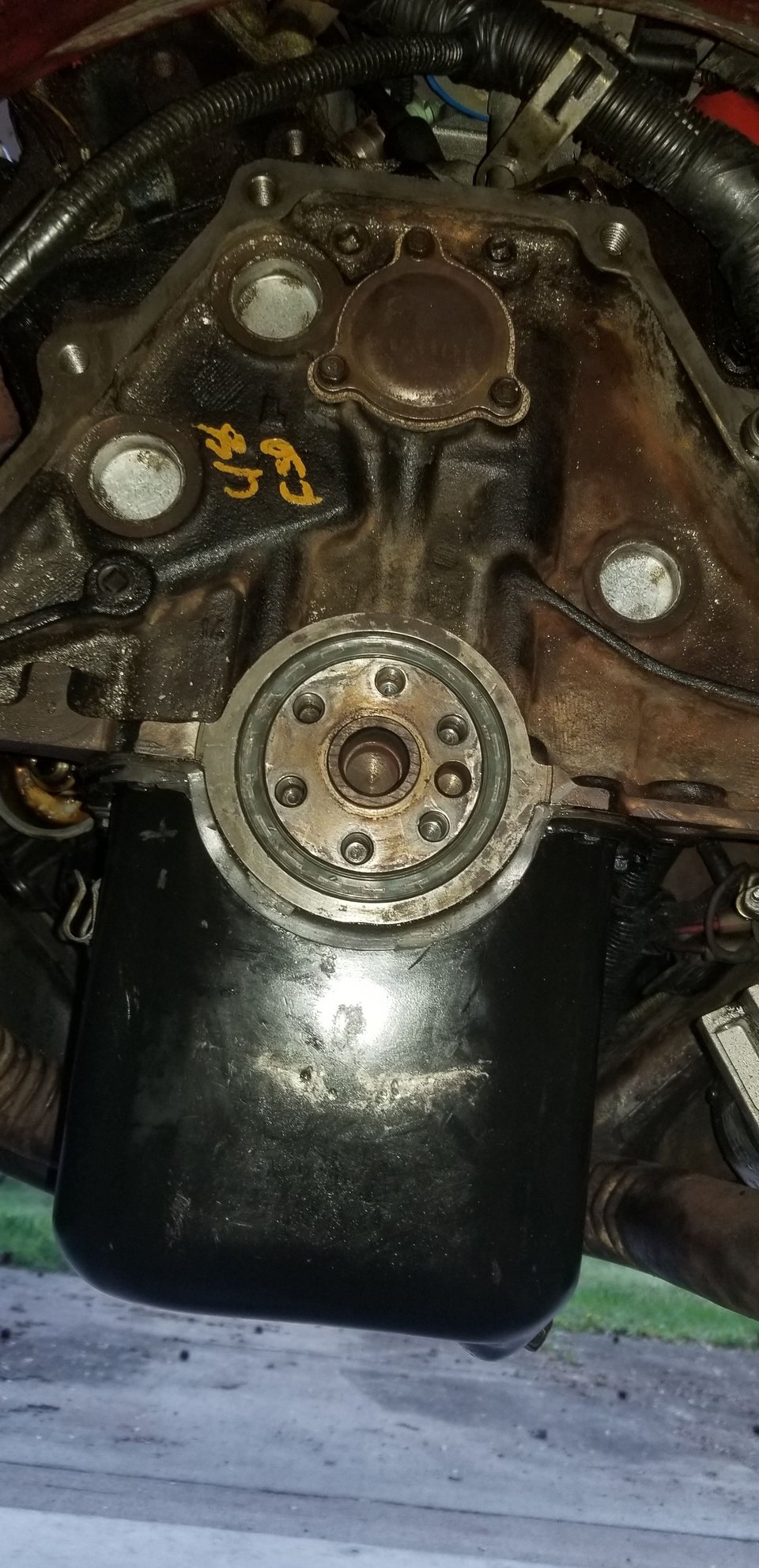 All clean!  New rear main, new cork cam cover gasket.  Ended up slathering some RTV on the rear sealing surface of the oil pan as well, there was a bit of a gap there....