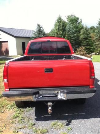 NEW BUMPER! God those things are expensive. It's an 88 truck, but I decided to keep the new model parts theme my dad had in mind. Yes, the dual exhaust out the back is gone, I'm getting a new true dual system installed! The old one rusted off.
