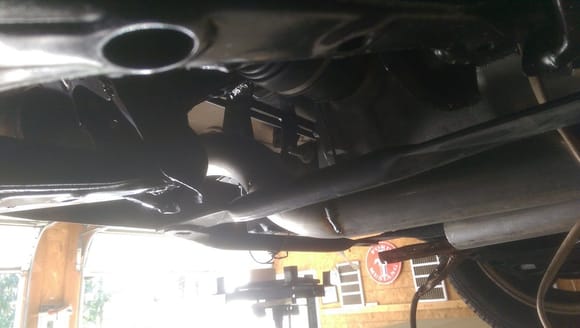 Exhaust routing at rear of car