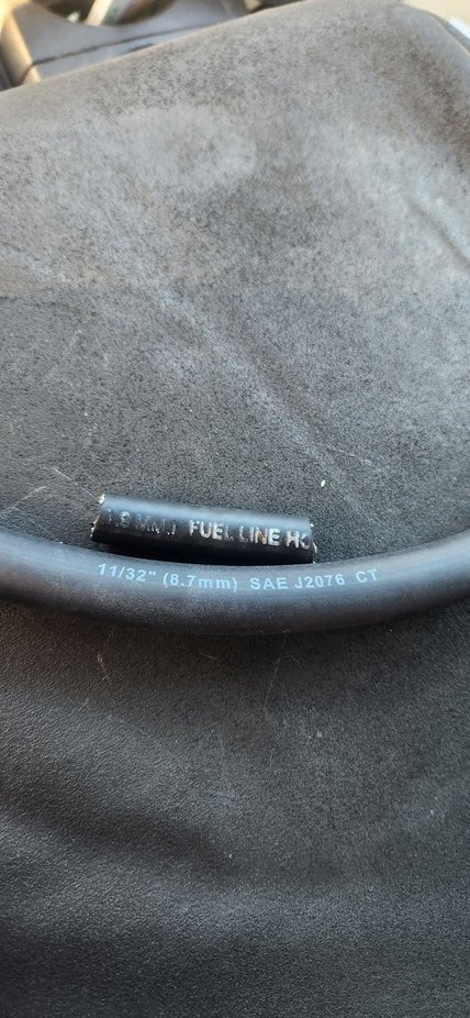 Cut the old hose out too disappointment he used fuel hose for atf. Which does work but is not really correct. The factory size hose is 11/32 for the trans cooler line. Fortunately Advance up the street had the correct size and hose for what i needed. A little pricey at $7/ft. Bought 4ft to replace both lines and a qt of atf.