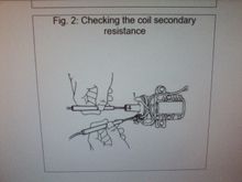 Secondary Resistance Testing, - & center port terminals on coil, ohm meter range 20,000.