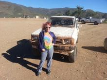 My wife with bad hair color but, still cool enough to go muddin' it me.