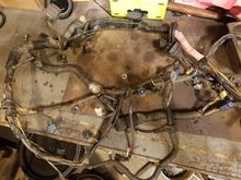Once the motor was in I began working on the Factory wiring harness. I deleted everything not needed to run the trans. Labeled each wire off the ecu to make it alot easier when going through each wire. Hopefully this will run the tranny with minimum input while the 1j ecu handles the motor.