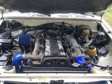 So this is currently as it sits 4/22/18. 
 Almost done, still have a little tig welding left in order for the top radiator connection to look good. Will have pics up and what was done when i do it. I did run a vacum line from the intake plenum to the stock vacum cannister. Started it and put it in 4wd and it actually actuated and worked lol. One more check off the wiring harness job.