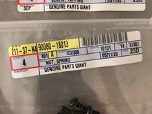 Radio bezel screws/spring nuts 