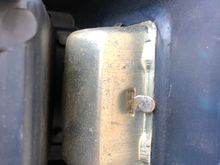 Bend these tabs back to remove the ash tray