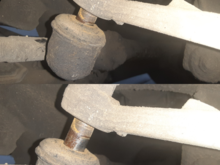 joint moves along pin on idler arm