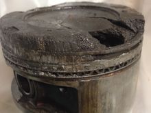 Melted hole right through piston!!