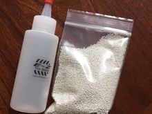 Dynamic ceramic beads and filler bottle