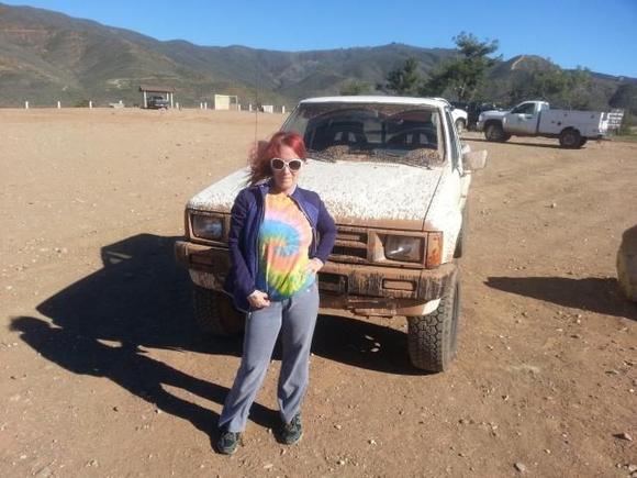 My wife with bad hair color but, still cool enough to go muddin' it me.