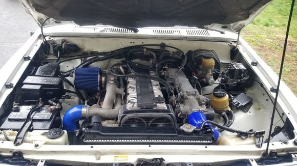 So this is currently as it sits 4/22/18. 
 Almost done, still have a little tig welding left in order for the top radiator connection to look good. Will have pics up and what was done when i do it. I did run a vacum line from the intake plenum to the stock vacum cannister. Started it and put it in 4wd and it actually actuated and worked lol. One more check off the wiring harness job.