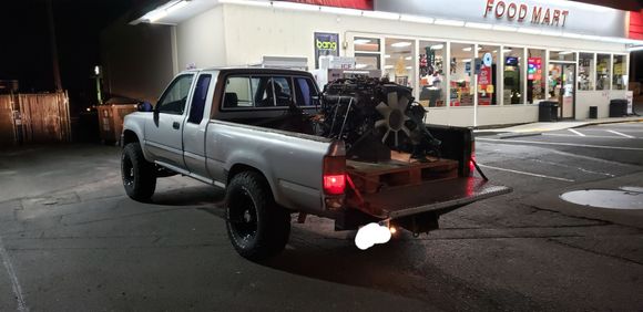 Fun Fact: a fully dressed RB26DETT with front diff and R32 gearbox and transfercase installed weighs approximately way too much! (~1000 lbs. I don't recommend/condone trying to haul anywhere near this much weight in the bed.)