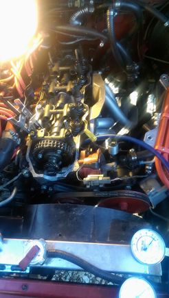 Intake side of the engine was pretty tight without removing the intake, but I managed....notice new cam sprocket set to "0".....I used the degree wheel to advance it to accommodate for the decked block and then advanced it slightly further to lower the power band into the lower RPM range
