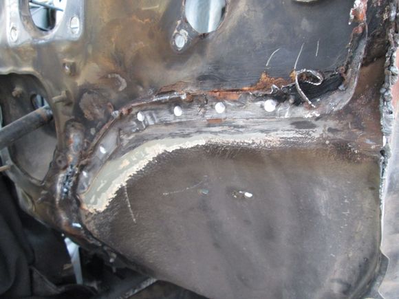 Removing whats left of the original flange for a pattern. Through my ownership of this truck this area was zip wheeled and hastely wired welded back together then this last time cut with a plasma so gluing it back together wasn't an option.