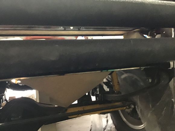 Front view of bumper. The bottom of the bracket is the shiny piece of steel beneath the bottom tube. Truck is parked too close to front wall of shop for a good picture. 