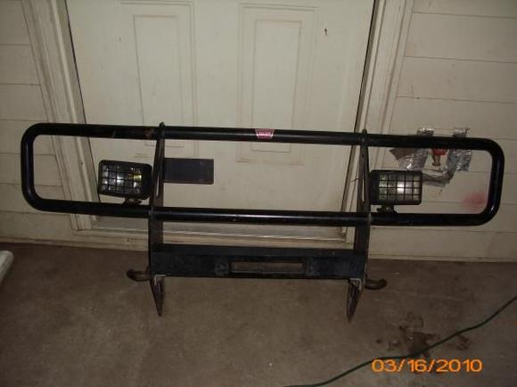 A WARN grill guard with a winch slot and offroad lights, I only paid $40 for it haha