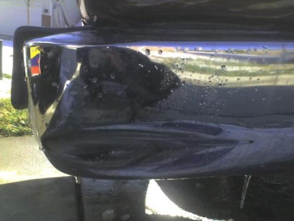 more side rail collision damage
new back bumper or ideas on repair?
again- its a rough dent