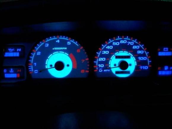 White faced illuminecent guages and carbon fiber bezel !