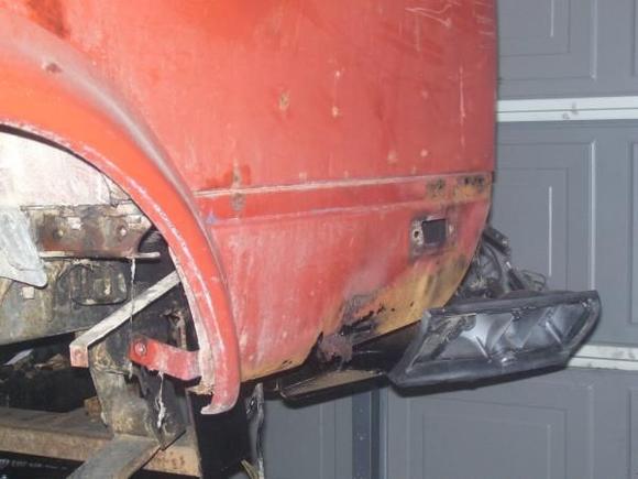 rusted out quarter panel