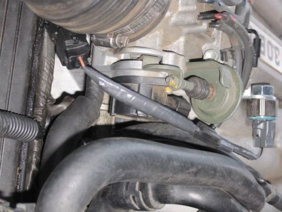 view from driver's side fender of 'pigtail'. It just hooks up to your engine harness like the actual sensor would.